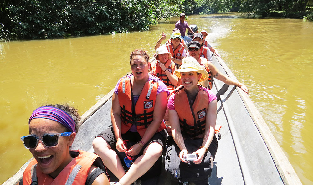 cuyabeno tour boat enjoy happy people adventure laugh amazon ecuador