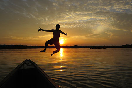 swim in laguna grande activity cuyabeno lodge amazon tour hiking