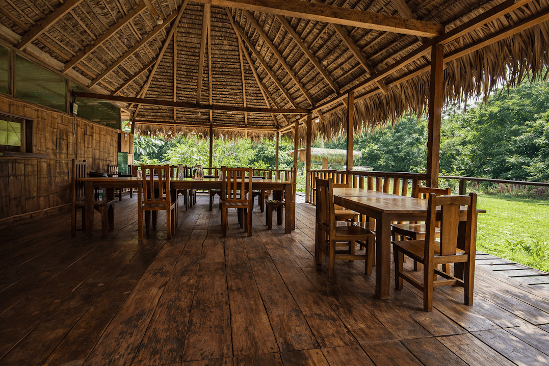 rustic dining area for guests to commune tucan cuyabeno lodge ecuador